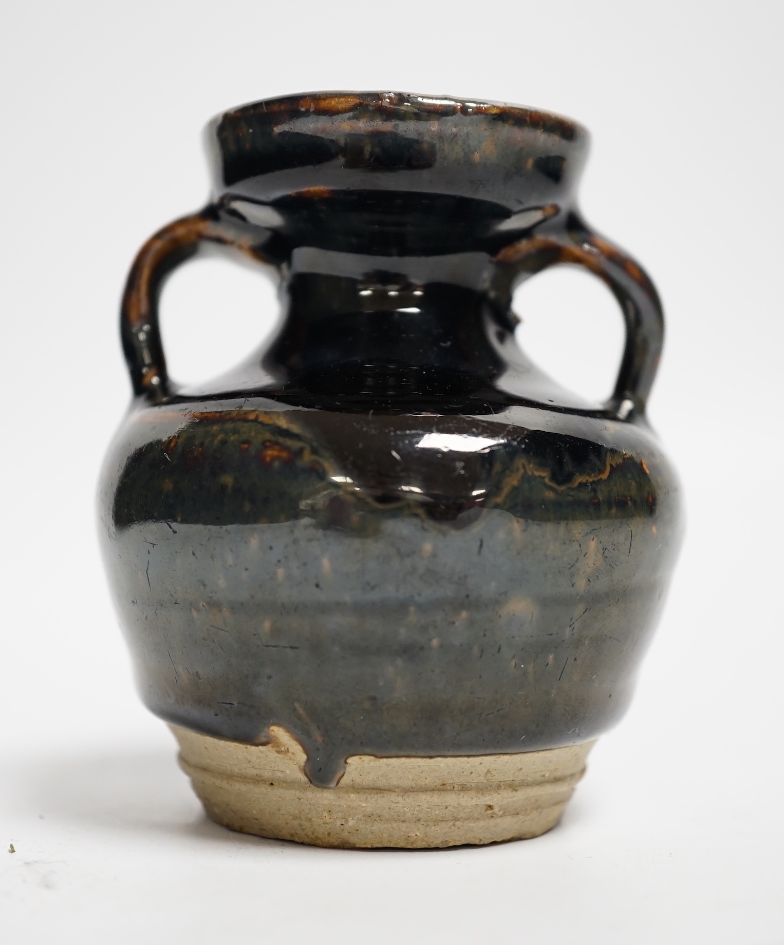 A Chinese Jian type two handled jar, possibly Song dynasty, 8cm high